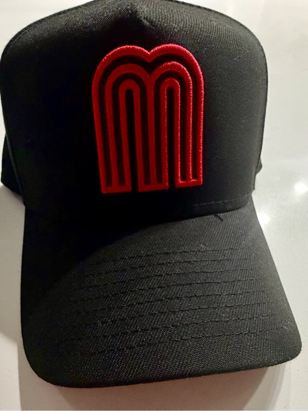 New Era Black Cap with Red Raised Logo